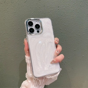Detail of glittery pearl white mica texture iPhone case with silver metal camera ring