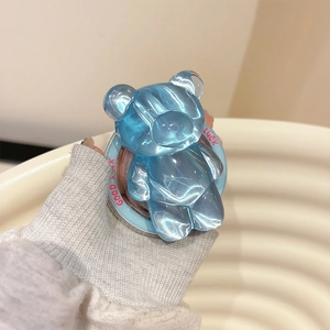 Blue 3D bear phone grip with water ripple effect and Good Luck printed text
