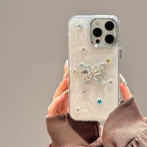 Elegant iPhone case featuring 3D rhinestone butterfly and shimmering glitter finish