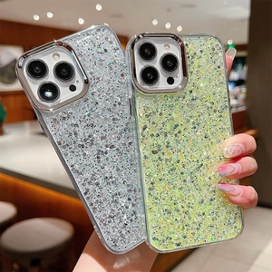Detail of glitter iPhone case with silver and neon green sequins and metal camera lens ring