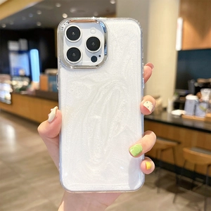 Detail of glitter white pearlescent iPhone case with silver metal camera lens frame protector