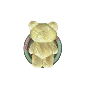 Translucent green bear phone grip with water ripple marble pattern and Good Luck text