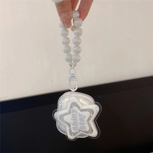 Detailed view of Shiny Star white glitter star pendant with elegant large pearl lanyard