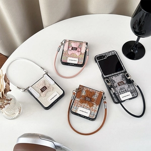 Bear-themed plaid folding phone case with 3D teddy bear and leather wrist strap