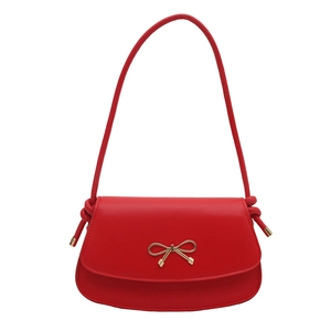 Elegant red bow crossbody bag in premium faux leather with gold metallic knot detail