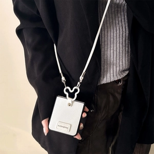 White leather phone crossbody bag featuring silver Mickey-shaped metal ring and thin strap