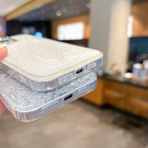 Detailed close-up of glitter sequins and precise port cutouts on a transparent phone case