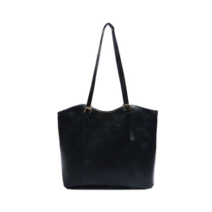 Black embossed faux leather tote bag with fashion patterns and adjustable straps