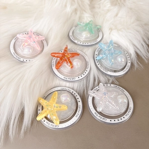 Starfish laser glitter phone socket grip set in six colors on fluffy white background