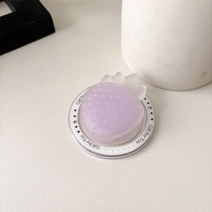 Detail of a matte lavender strawberry magnetic phone grip with semi-transparent leaf finish