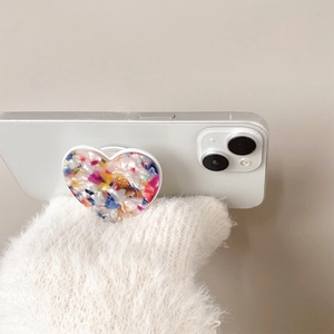 Ins style heart-shaped pop socket with colorful textured pattern on a white phone case