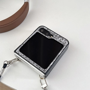 Detail of Galaxy Z Flip case with black woven texture and silver metal buckle lanyard
