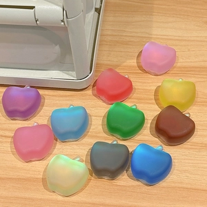 Colorful apple-shaped matte phone socket grips in various translucent resin colors