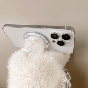 Close-up of star-shaped glitter phone grip with Gift For You text on a white smartphone