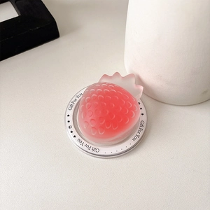 Detail of pink strawberry magnetic phone grip with Gift For You print on clear base
