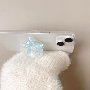Glitter starfish expanding phone socket on silver mobile back for hands-free viewing