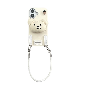 Creamy leather iPhone 16 Pro Max case with plush bear charm and long crossbody strap
