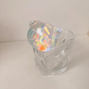 Detailed view of holographic panda phone socket showing translucent rainbow finish