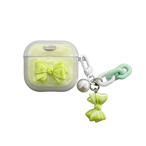 Mint green glitter AirPods case with 3D bow and pearl keychain accessory