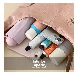 Pink lychee grain tote bag interior showing large capacity for essentials like tablet and phone