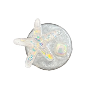 Sparkly glitter resin starfish phone grip with iridescent sequins and retractable base