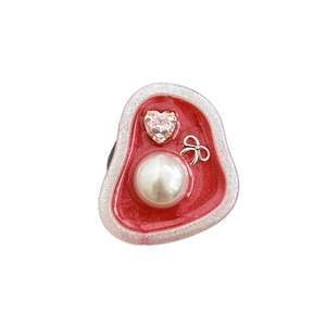 Red enamel heart phone grip with rhinestones, pearls and a silver bow detail