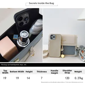Detail view of the interior space of the color-block square crossbody bag for women