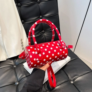 Borsa a cilindro rossa a pois con manico e tracolla staccabile per la moda estiva