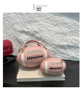 Detail of light pink rugby-shaped handbag and mini coin purse with gold chain hardware