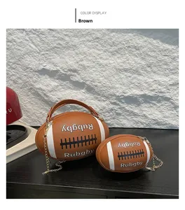 Detail of rugby-shaped brown leather handbags with white stitching and chain straps