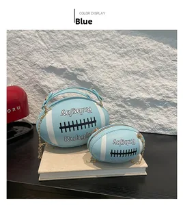 Detail view of two light blue PU leather rugby-shaped bags with chain straps