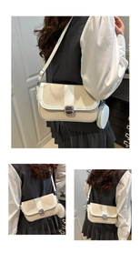 Detail of woven straw texture and white leather flap on trendy square shoulder bag