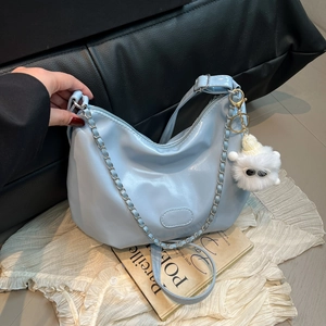 Light blue glossy Hobo shoulder bag with chain strap and cute monster plush charm