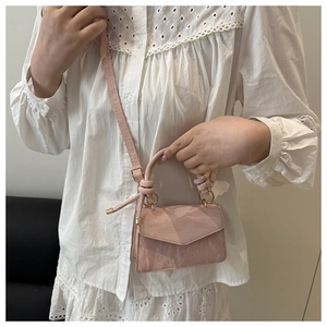 Pink marble texture handbag with gold ring hardware and stylish knotted shoulder strap