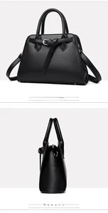 Detail view showing black litchi texture leather and decorative buckle on the handbag