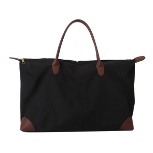 Bolso de viaje negro grande y elegante con asas de cuero marrón y esquinas reforzadas