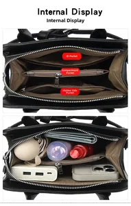 Internal display of black tote bag showing spacious compartments and layered storage