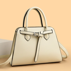 Minimalist off-white trapezoid handbag with buckle detail and black edges for women