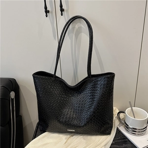 Large black woven leather tote bag for women with fashion metal logo for work use