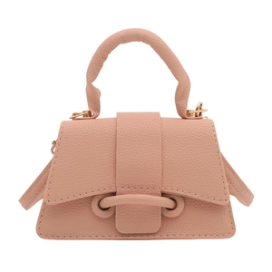 Pink lychee grain leather mini handbag with top handle and gold hardware detail