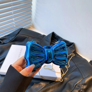Mini borsa chic in acrilico blu metallizzato a forma di fiocco con catena oro