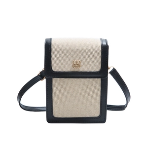 Contrast stitching crossbody phone bag with cream canvas and black leather trim