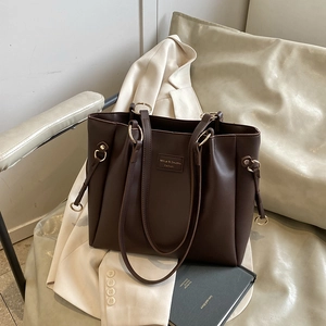 Deep brown minimalist tote bag in matte faux leather for women, large shoulder bag style