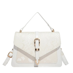 White crossbody bag with faux snake skin flap and gold horseshoe buckle detail