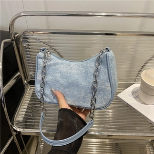 Chic light blue denim underarm bag with rhinestones and chunky silver chain strap