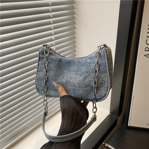 Chic blue denim underarm bag with sparkling rhinestones and silver metal chain strap