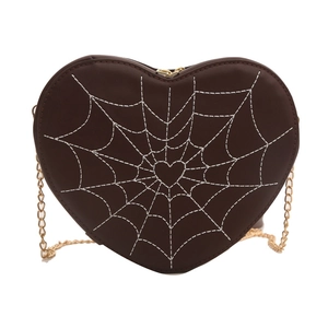 Dark brown heart-shaped crossbody bag with white spider web embroidery and gold chain
