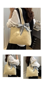 Detail of large beige woven straw tote bag with elegant blue floral silk scarf accessory