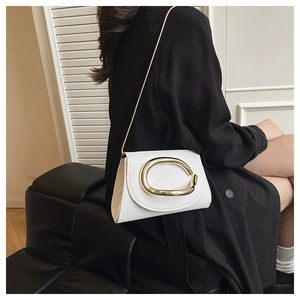 Detailed side view of white PU leather bag with large gold ring buckle and chain strap