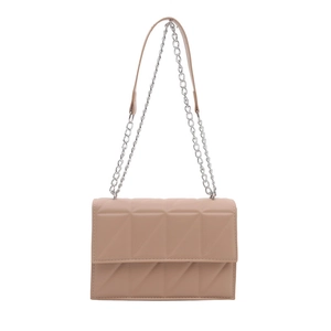 Quilted pink crossbody bag with geometric triangle pattern and silver chain strap